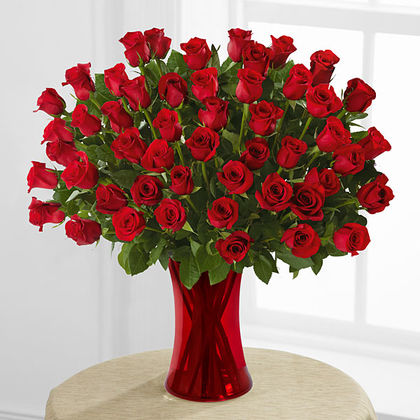 Premium-Fifty Red Roses arranged in Red Vase